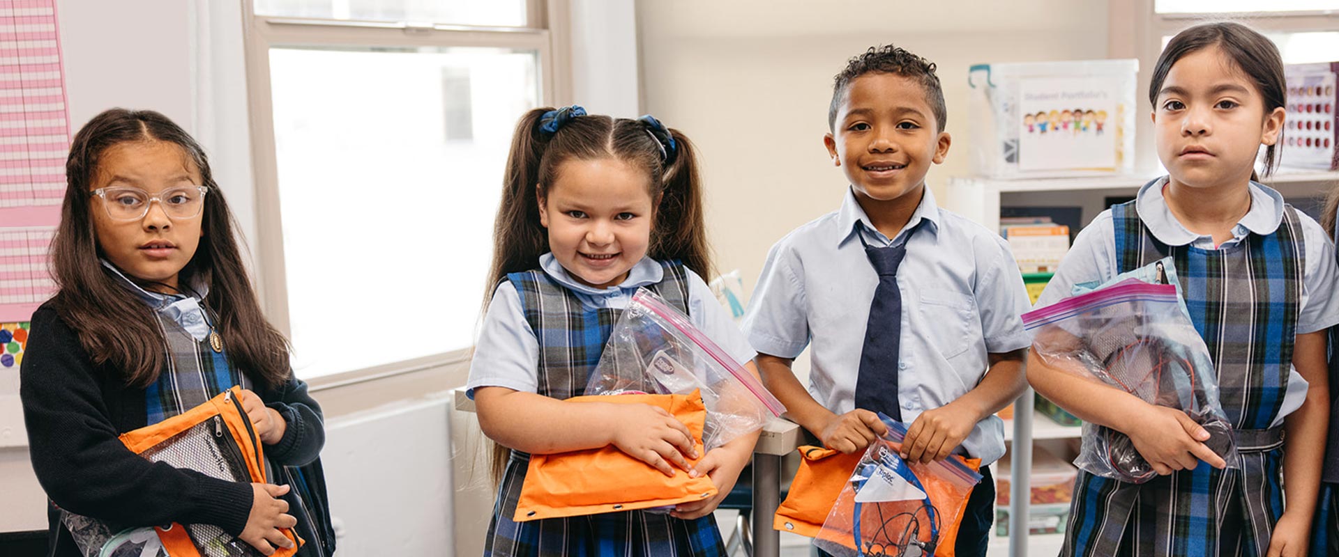 St. Raphael students with their supplies