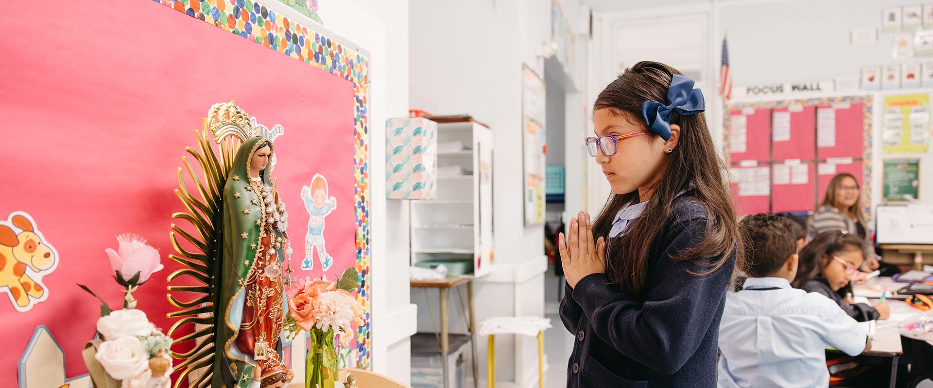St. Raphael student praying